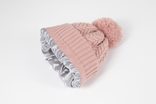 Load image into Gallery viewer, Dusted Rose Satin Lined Bobble Hat - Black Sunrise UK Satin Lined Hats,. Satin lined Beanie, Hoodies. For children, adults, babies. For those with curly natural hair, sensitive scalps and fragile curls.