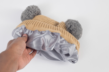 Load image into Gallery viewer, Tan and Grey Pom Pom - Child 1-3 Years Satin Lined Beanie - Black Sunrise UK Satin Lined Hats,. Satin lined Beanie, Hoodies. For children, adults, babies. For those with curly natural hair, sensitive scalps and fragile curls.