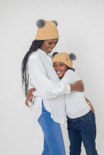 Load image into Gallery viewer, Adult Sized Tan and Grey Pom Pom Satin Lined Beanie - Black Sunrise UK Satin Lined Hats,. Satin lined Beanie, Hoodies. For children, adults, babies. For those with curly natural hair, sensitive scalps and fragile curls.
