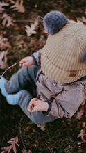 Load image into Gallery viewer, Tan and Grey Pom Pom - Child 1-3 Years Satin Lined Beanie - Black Sunrise UK Satin Lined Hats,. Satin lined Beanie, Hoodies. For children, adults, babies. For those with curly natural hair, sensitive scalps and fragile curls.