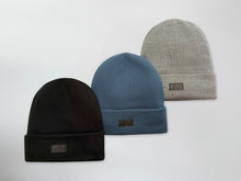 Load image into Gallery viewer, Three Satin Lined beanies in black, blue, and gray on a white background satin lined
