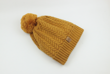 Load image into Gallery viewer, Golden Ochre Satin Lined Bobble Hat - Black Sunrise UK Satin Lined Hats,. Satin lined Beanie, Hoodies. For children, adults, babies. For those with curly natural hair, sensitive scalps and fragile curls.
