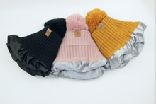 Load image into Gallery viewer, Golden Ochre Satin Lined Bobble Hat - Black Sunrise UK Satin Lined Hats,. Satin lined Beanie, Hoodies. For children, adults, babies. For those with curly natural hair, sensitive scalps and fragile curls.
